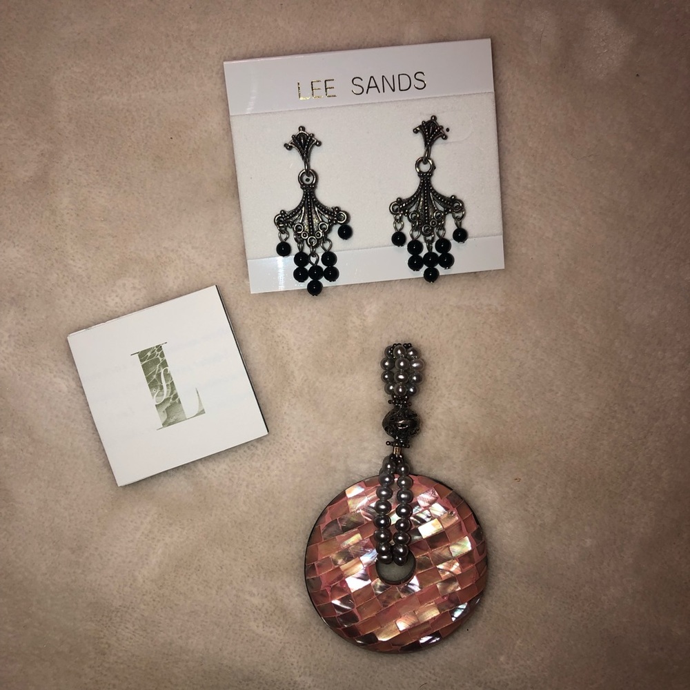 Lee Sands earnings and pendant